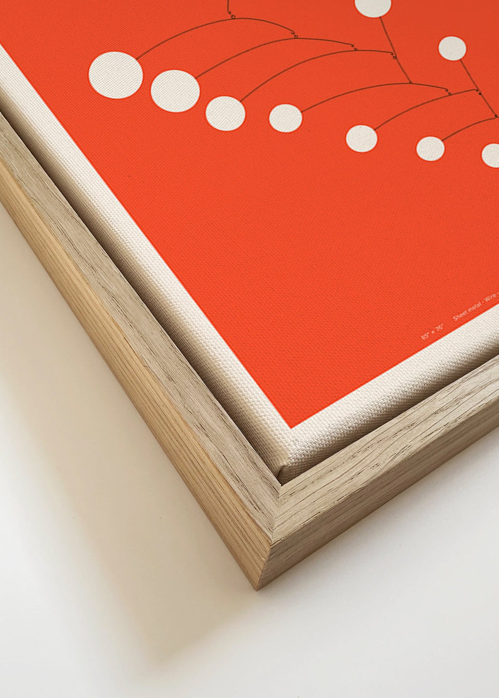 Abstract red mobile artwork with circles
