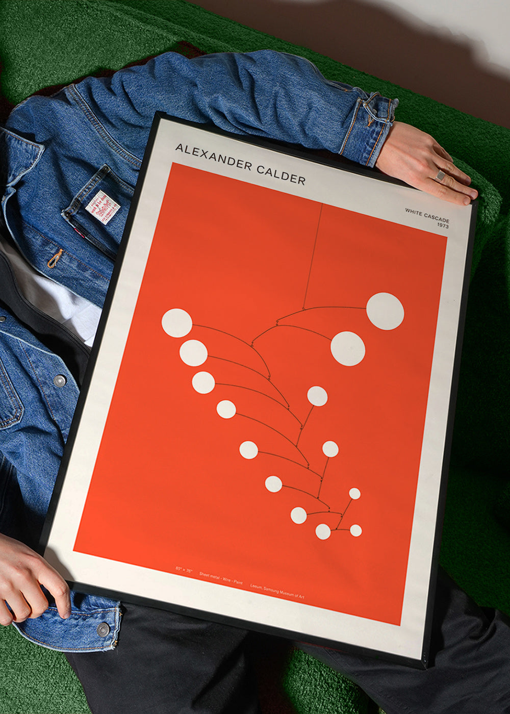 Abstract red mobile artwork with circles