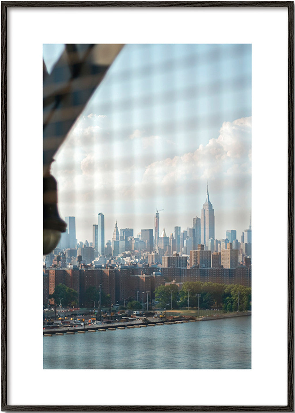 City print showing skyline through a window