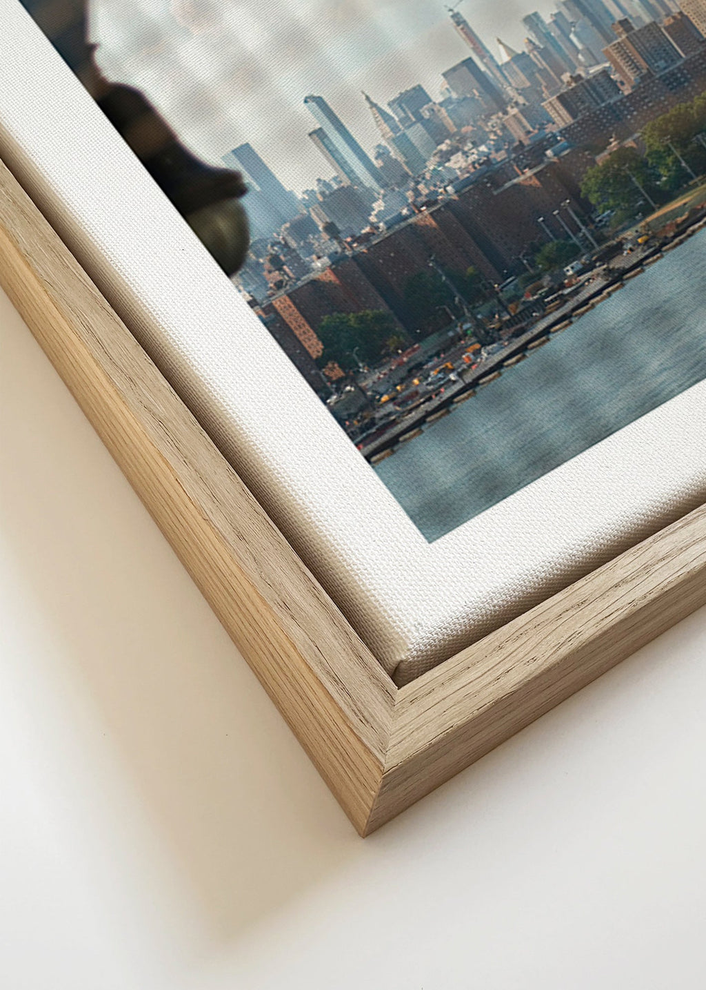 City print showing skyline through a window
