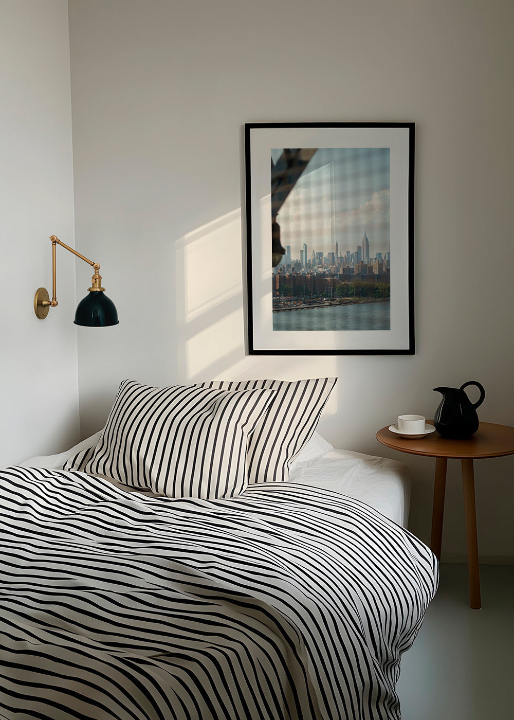 City print showing skyline through a window