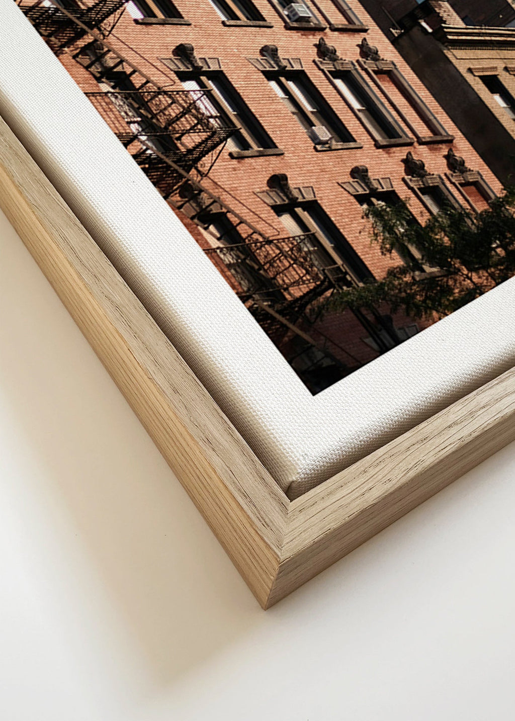 Urban façade photograph with fire escape