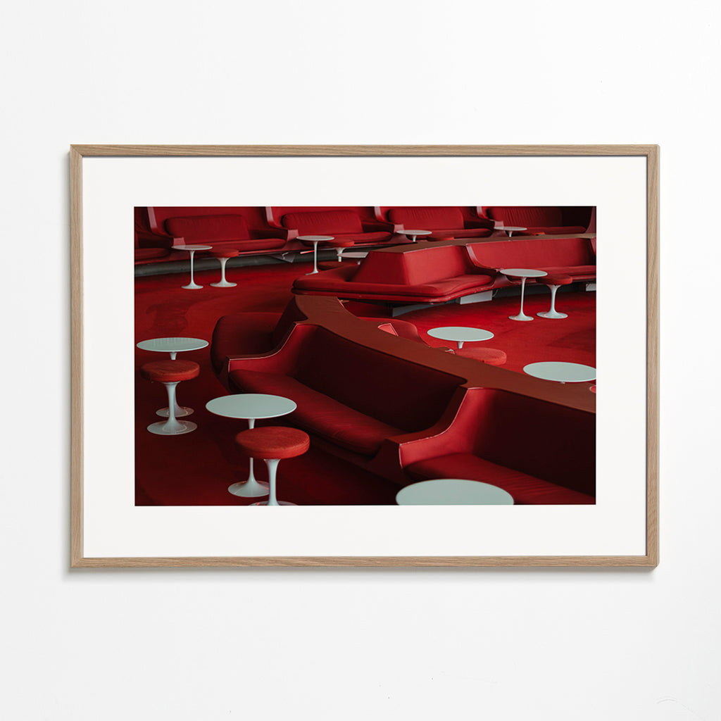 Red lounge photograph with curved seating