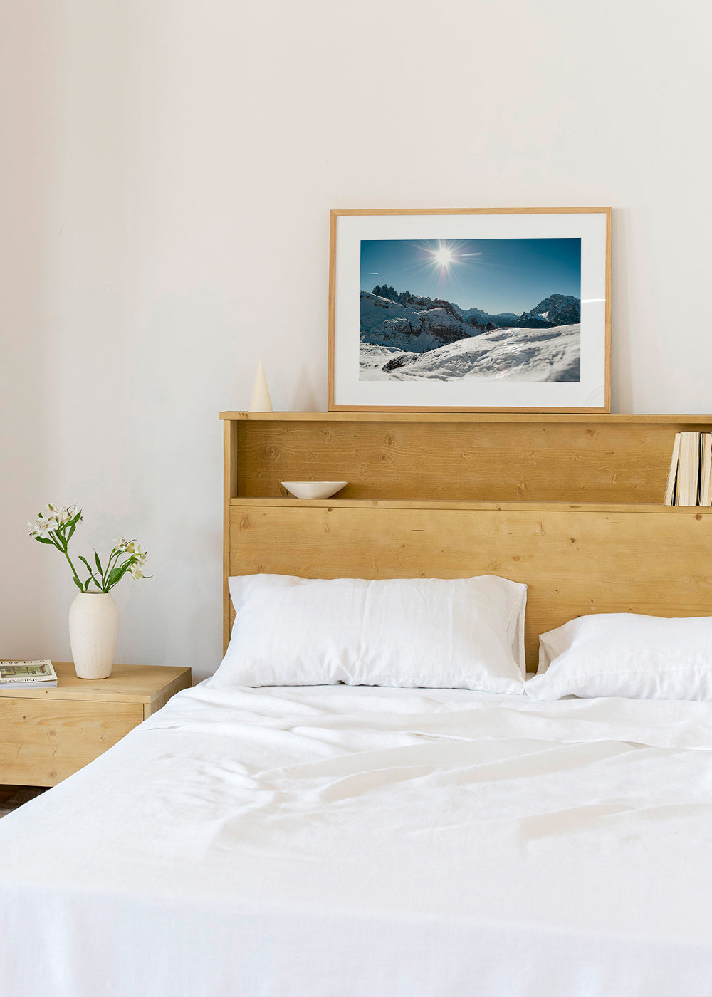 Landscape art: snowy mountain range under bright sun