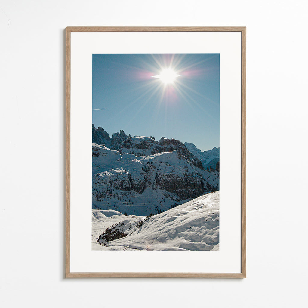 Landscape art: snowy peaks under bright sun