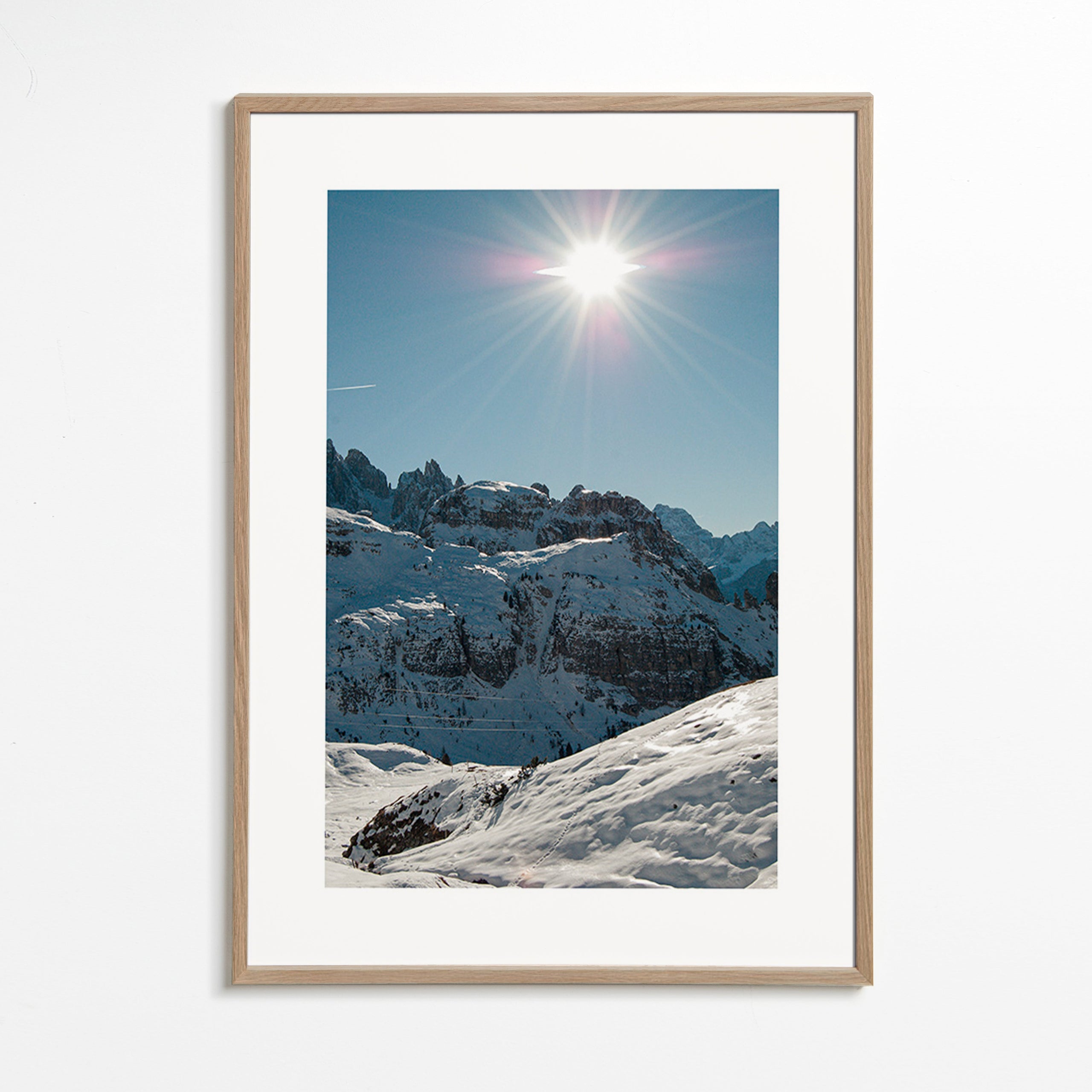 Landscape art: snowy peaks under bright sun