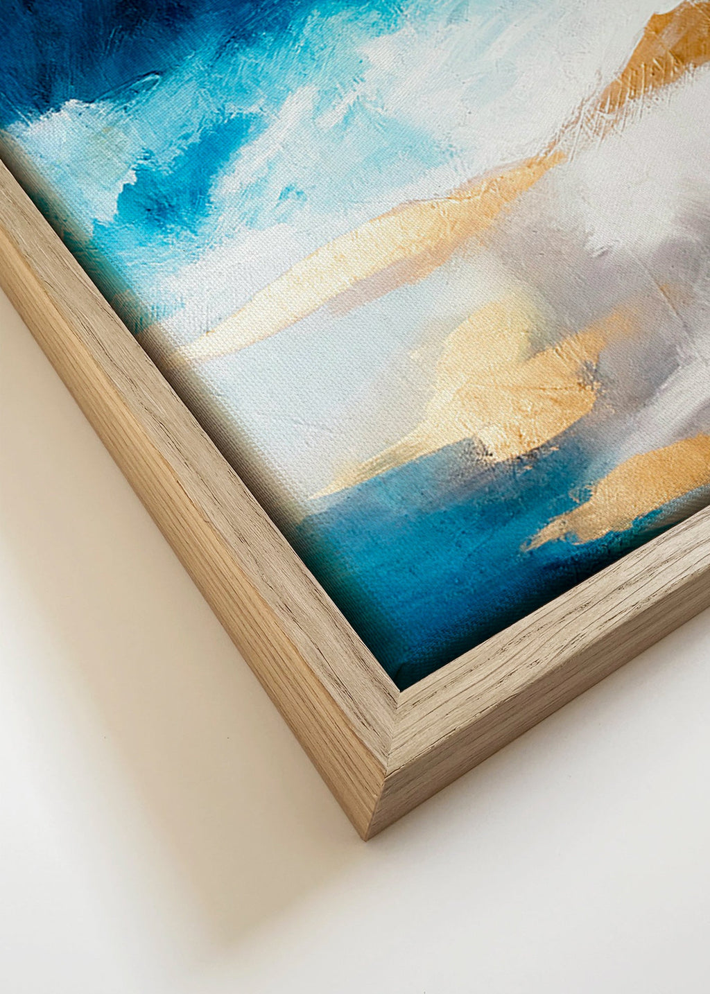 Cuadro abstracto azul y dorado en textura – Canvas detail