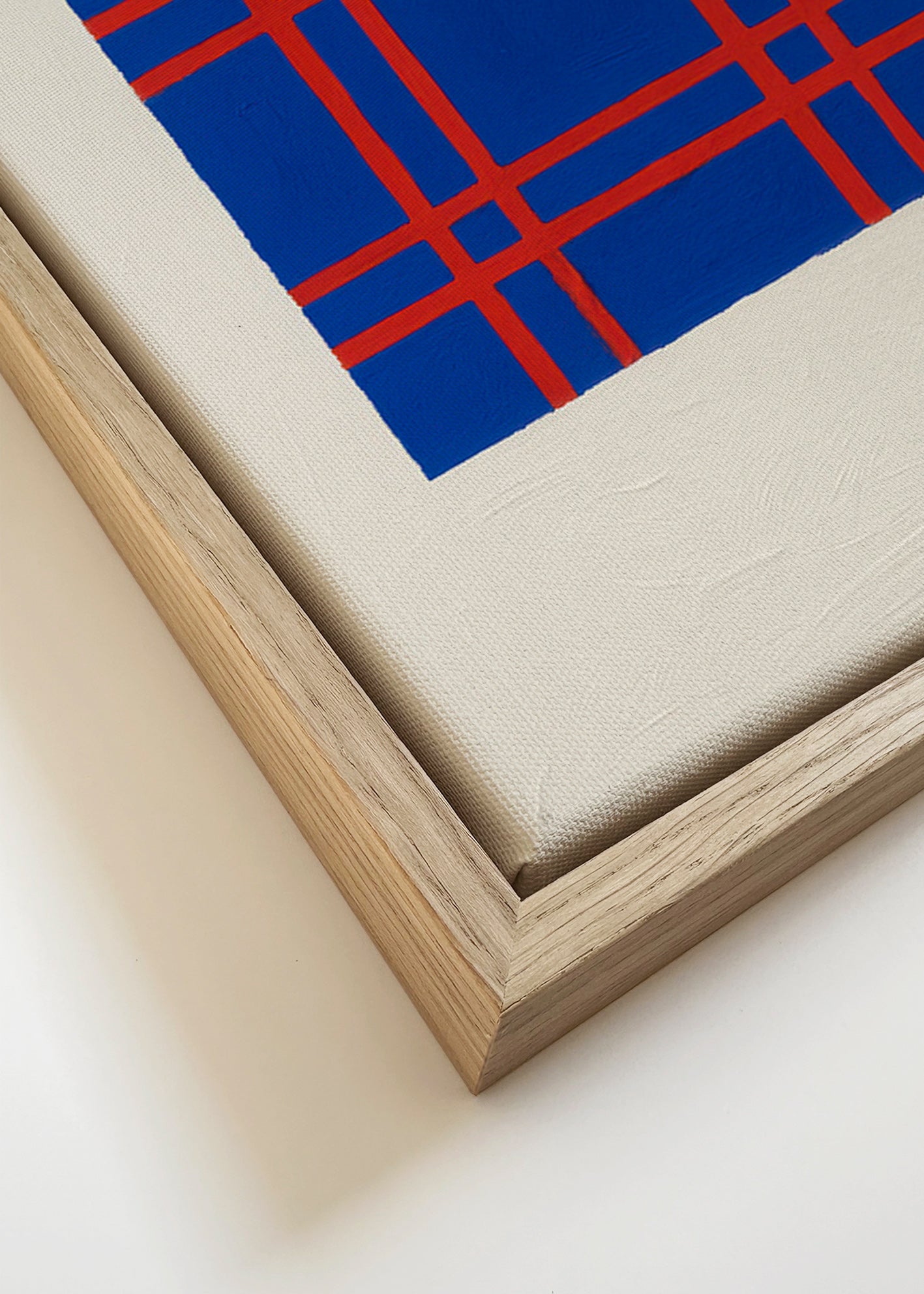 Cuadro geométrico azul con trama roja – Canvas detail