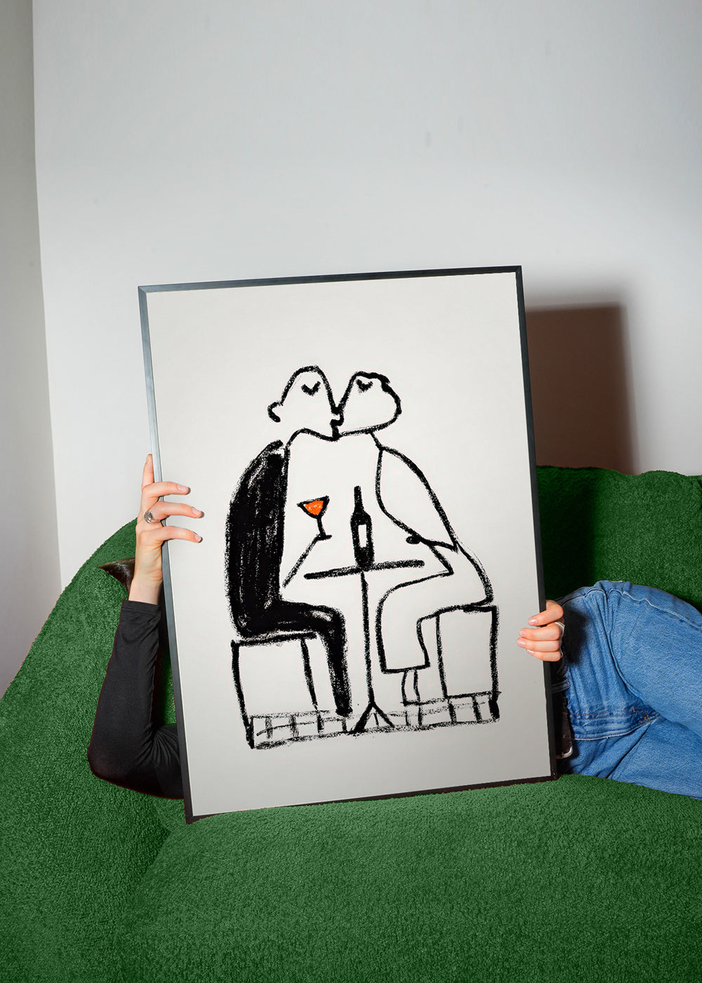 Kitchen art: couple sharing a wine