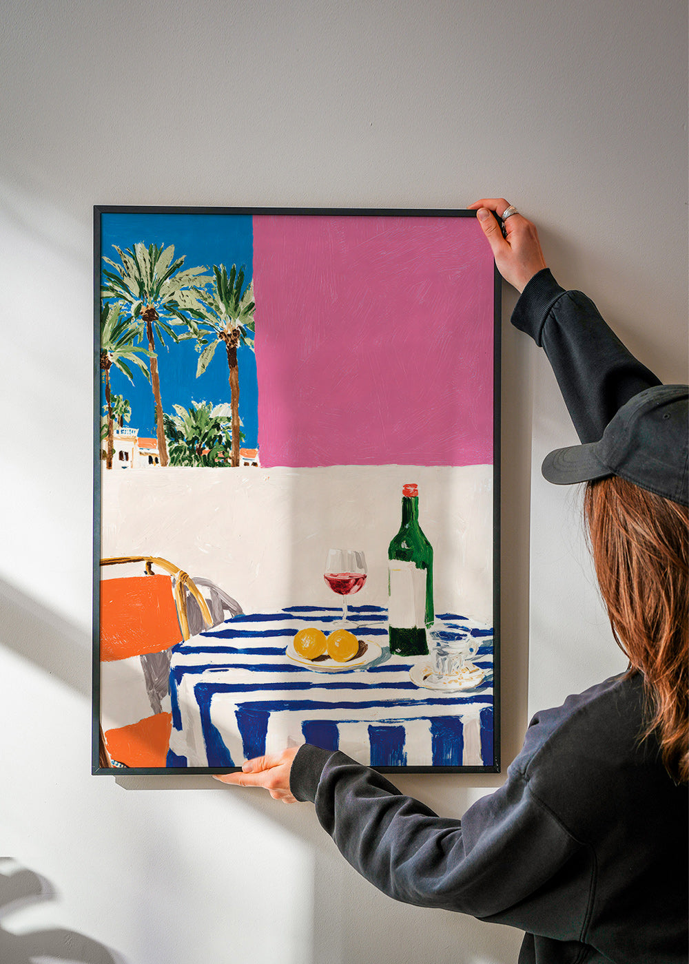 Kitchen art with striped table, wine and palms