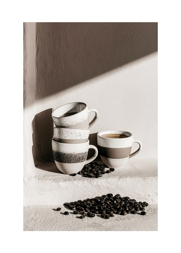 Kitchen art: stacked mugs with coffee beans