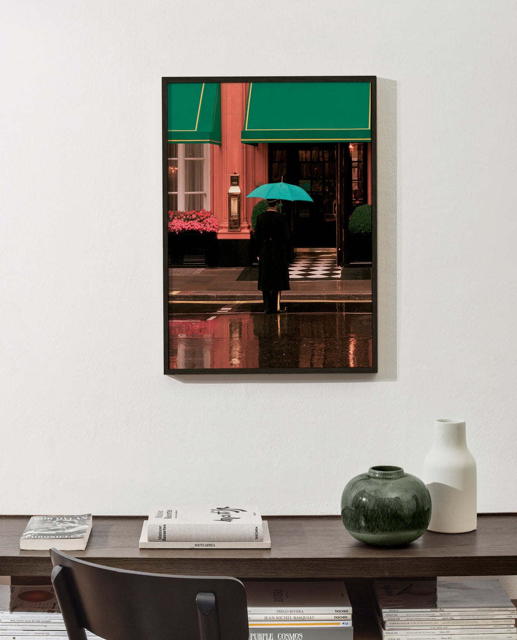 City photograph: lone figure with umbrella and reflections