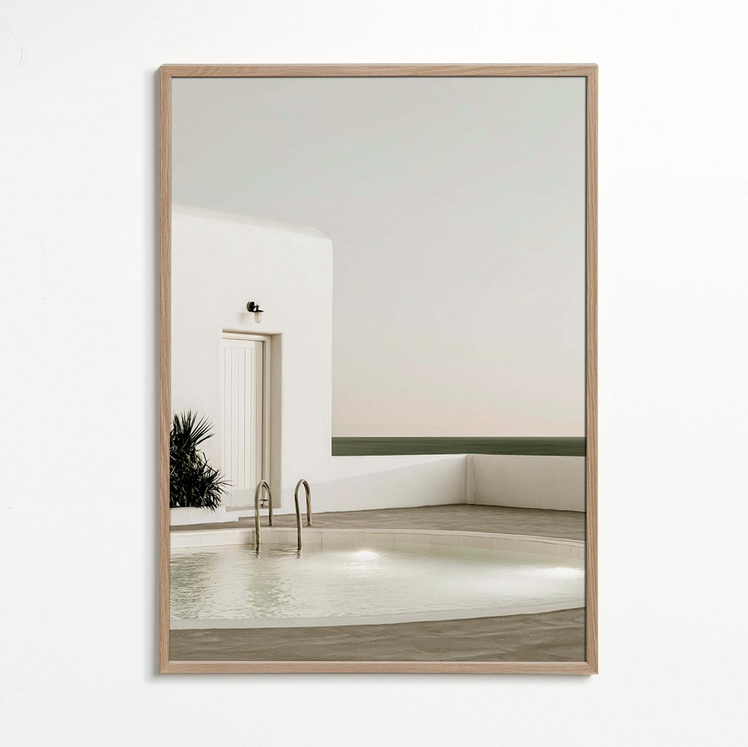 Photograph of a minimalist pool and white architecture