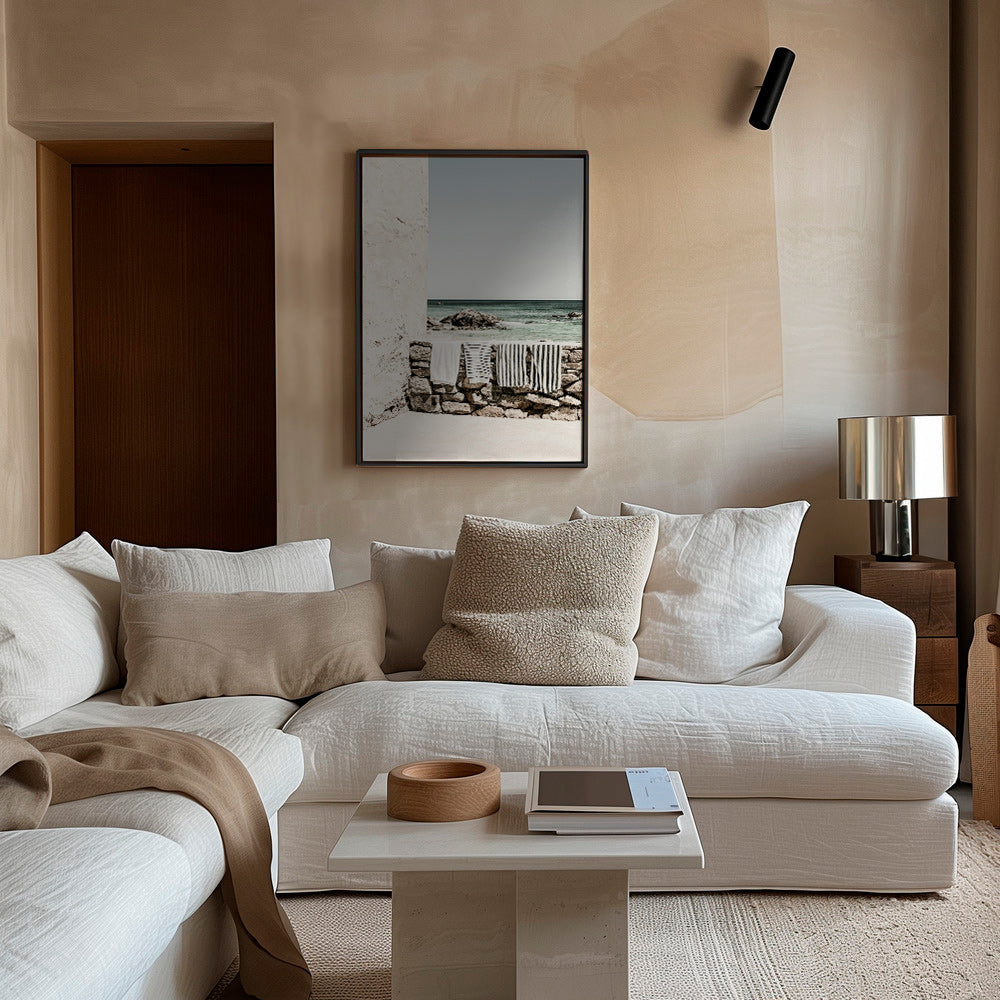 Coastal landscape photograph with hanging towels